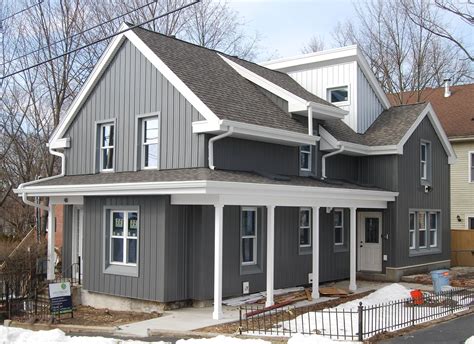 sheet metal siding for houses|houses with vertical metal siding.